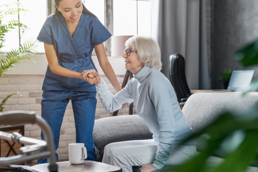 professional-caregiver-taking-care-of-elderly-woma-2026-01-07-05-23-41-utc-large